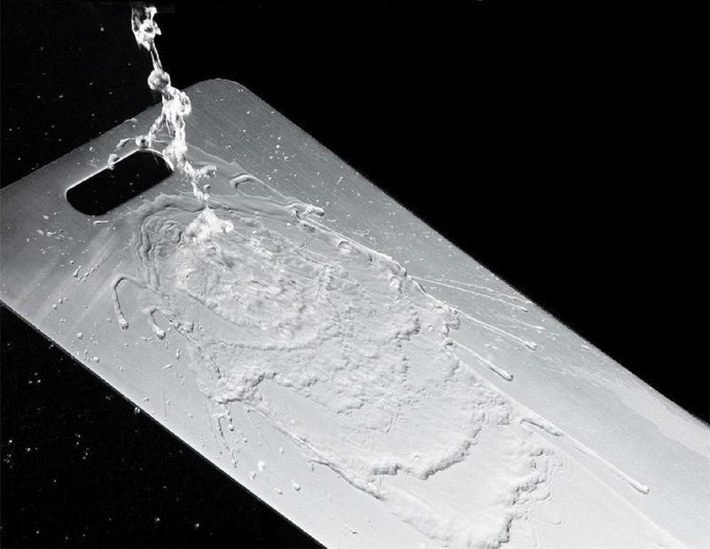 Planche à découper en acier inoxydable se fait laver