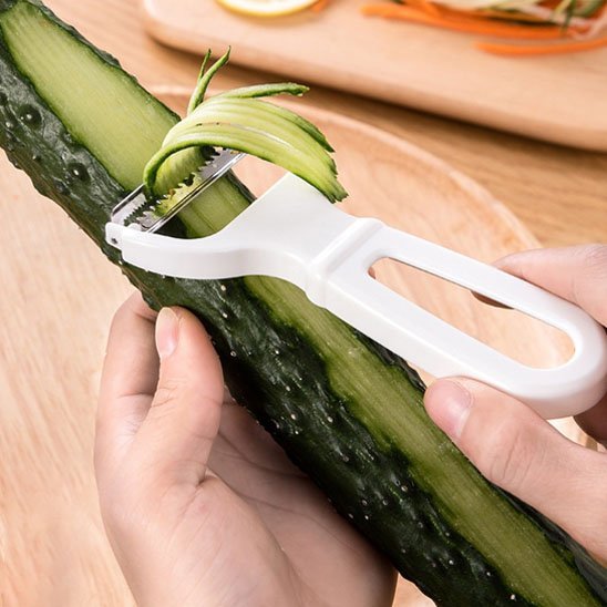 Chef épluche concombre Econome efficace