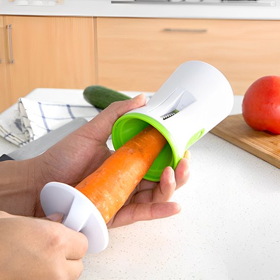 Coupe légumes avec poussoir sécuritaire