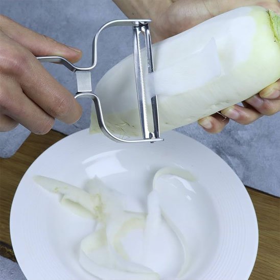 économe cuisine inox avec lame large