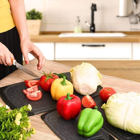 ensemble de planche à découper noires