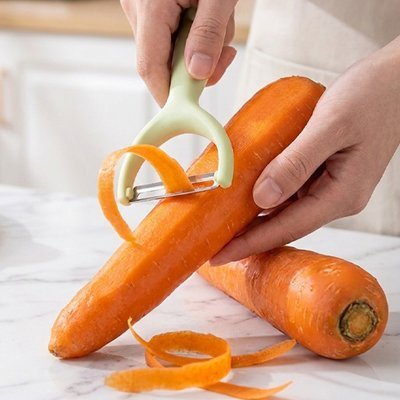 Éplucheur à légumes pour carotte