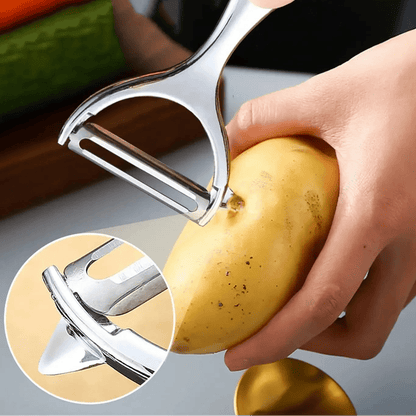 Eplucheur pomme de terre muni d'un extracteur d'yeux de pomme de terre
