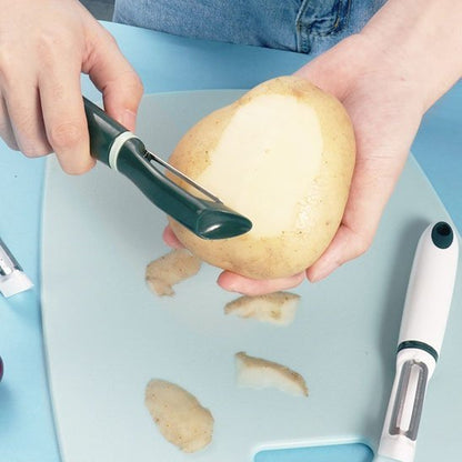 femme épluche pomme de terre avec Econome vert